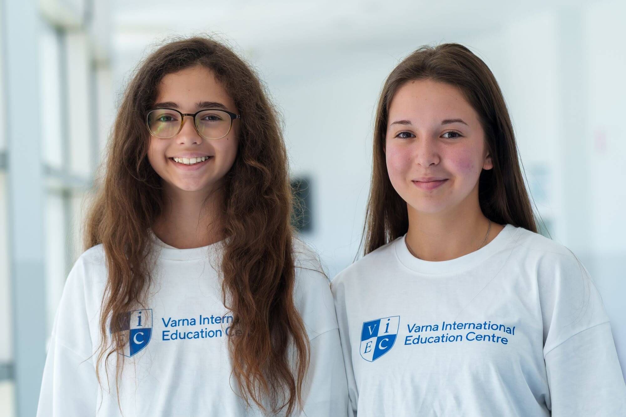 Two girls in VIEC T-shirts at the winter English camp in Egypt