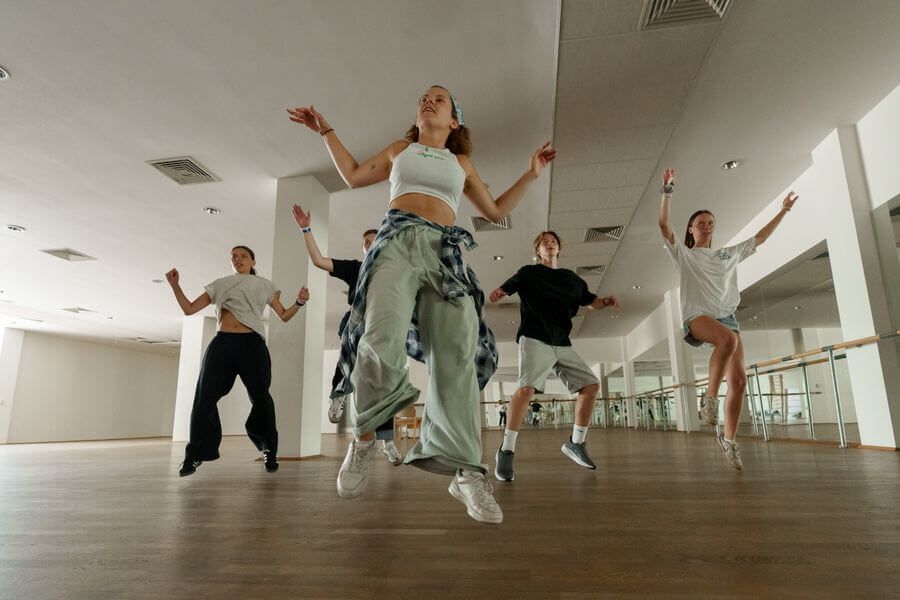 Dance class jumping in the studio