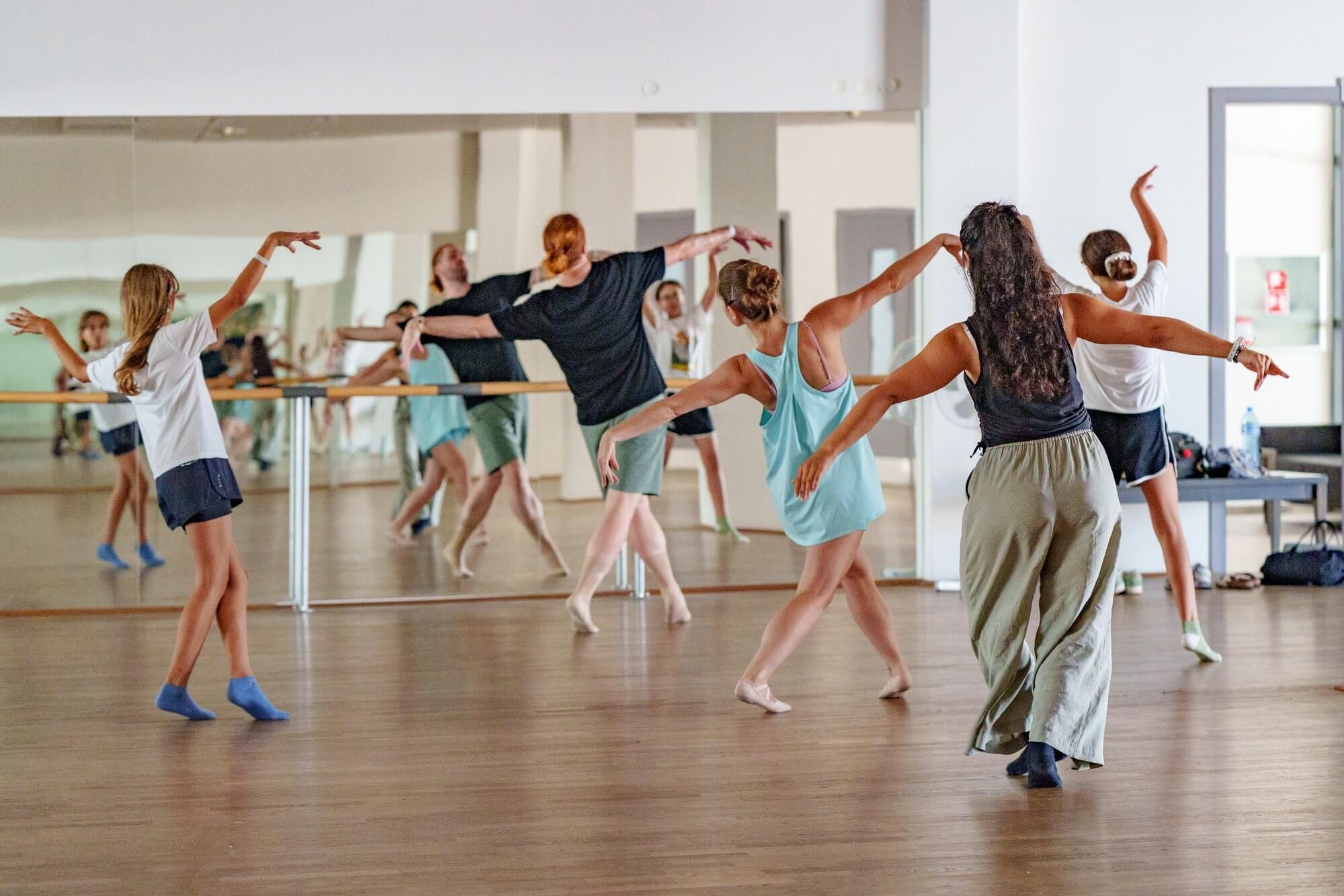 Children dancing together in a studio class at VIEC summer camp